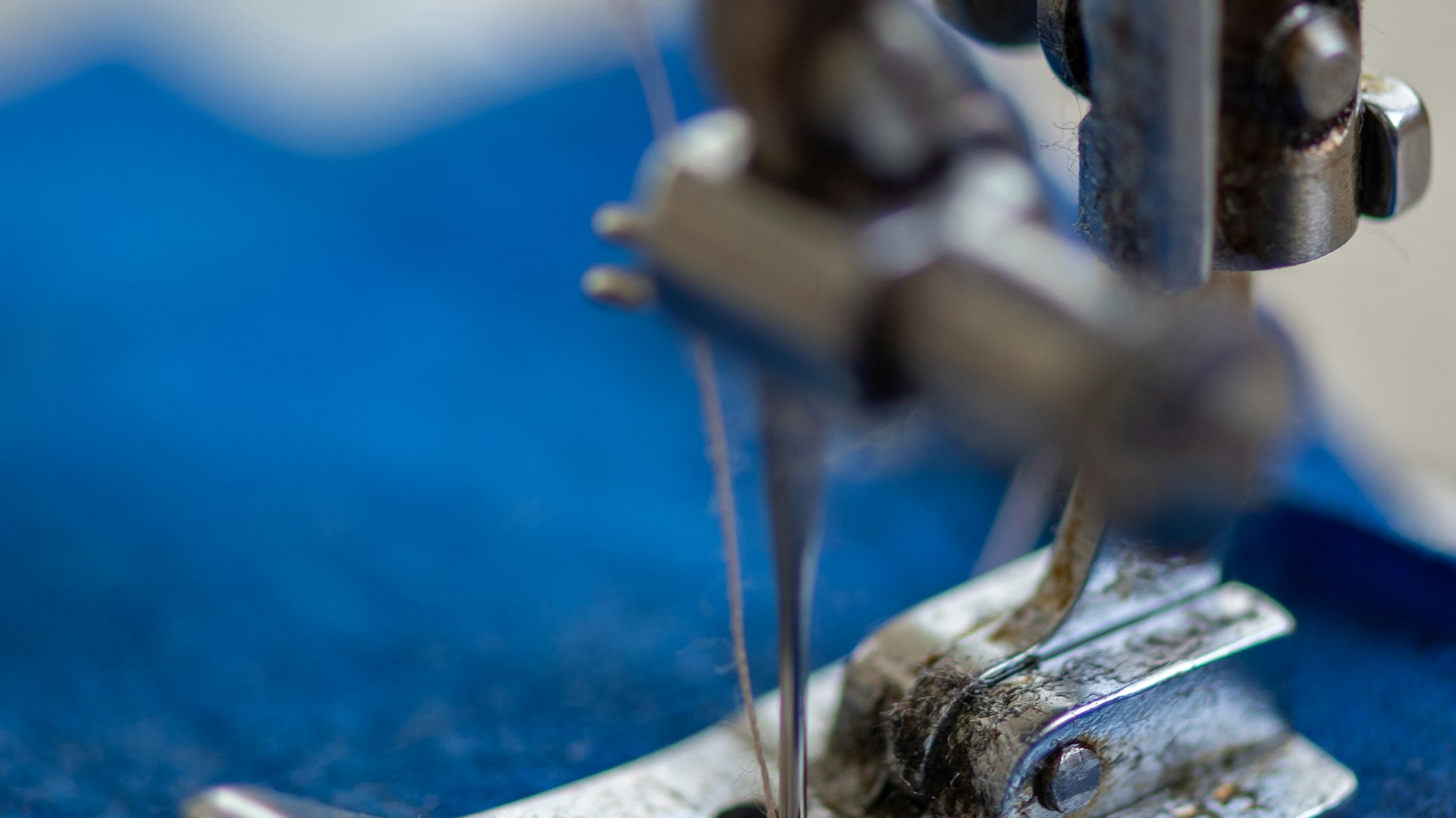 Close-up of an embroidery machine stitching a design